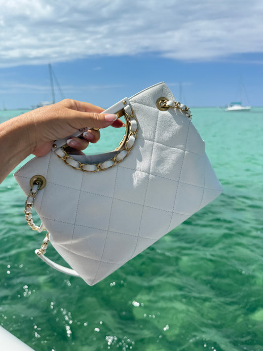 Chanel a Real Catch handbag in white caviar with gold hardware authentic for sale from purseonalshopper