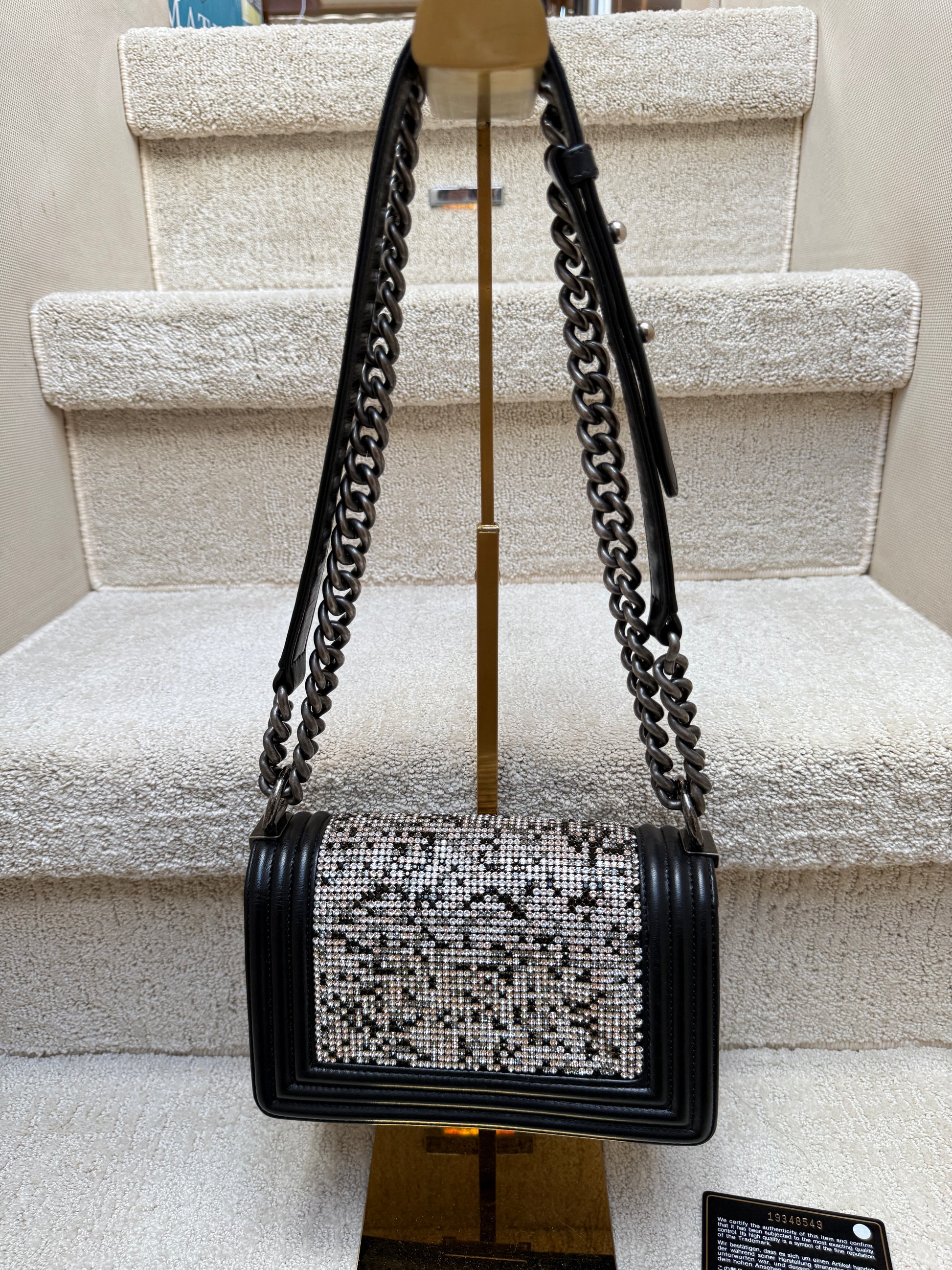 chanel boy bag shown back side of bag covered with swarovski crystals in stunning condition used and excellent