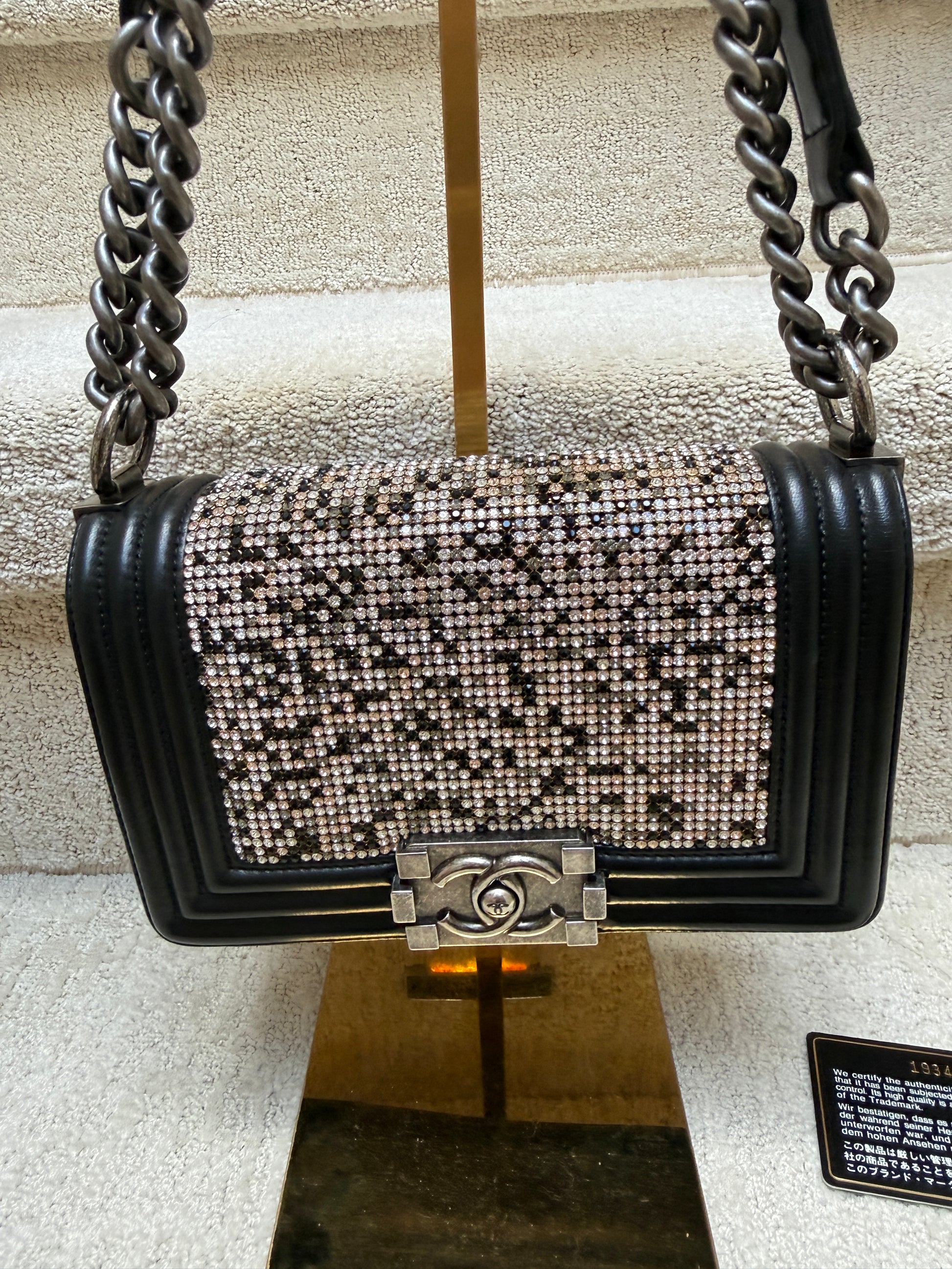 Close up with swarovski crystals on chanel boy bag small size with ruthenium hardware for sale from purseonalshopper.