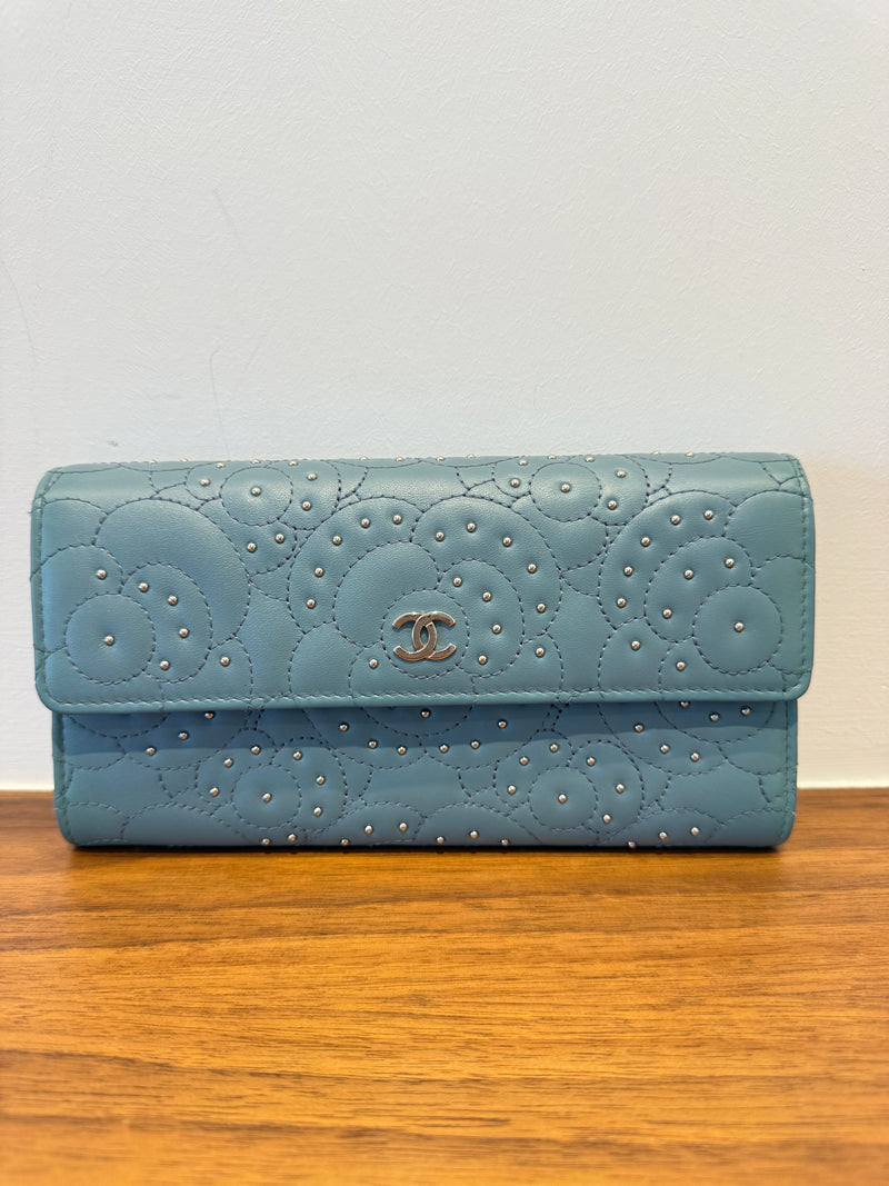 Chanel camellia wallet in blue leather with studs is authentic and preowned from purseonalshopper
