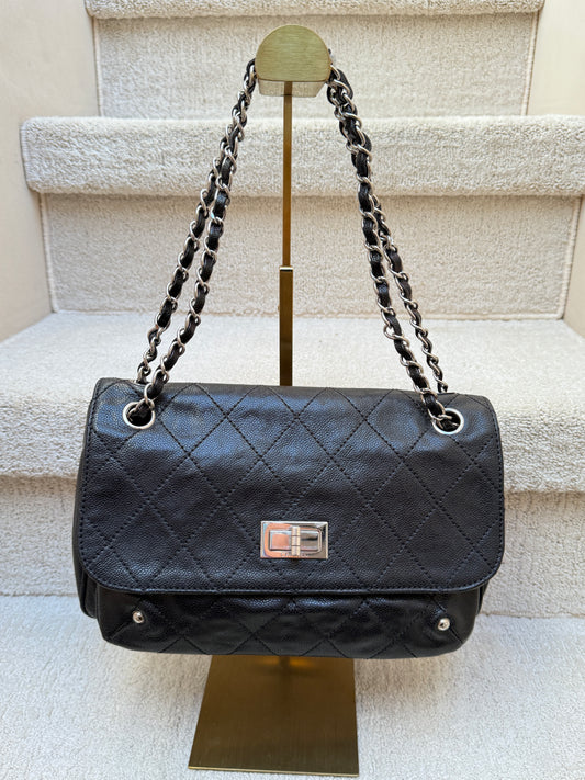 Chanel 2.55 caviar flap handbag in black calfskin leather with silver hardware full front view