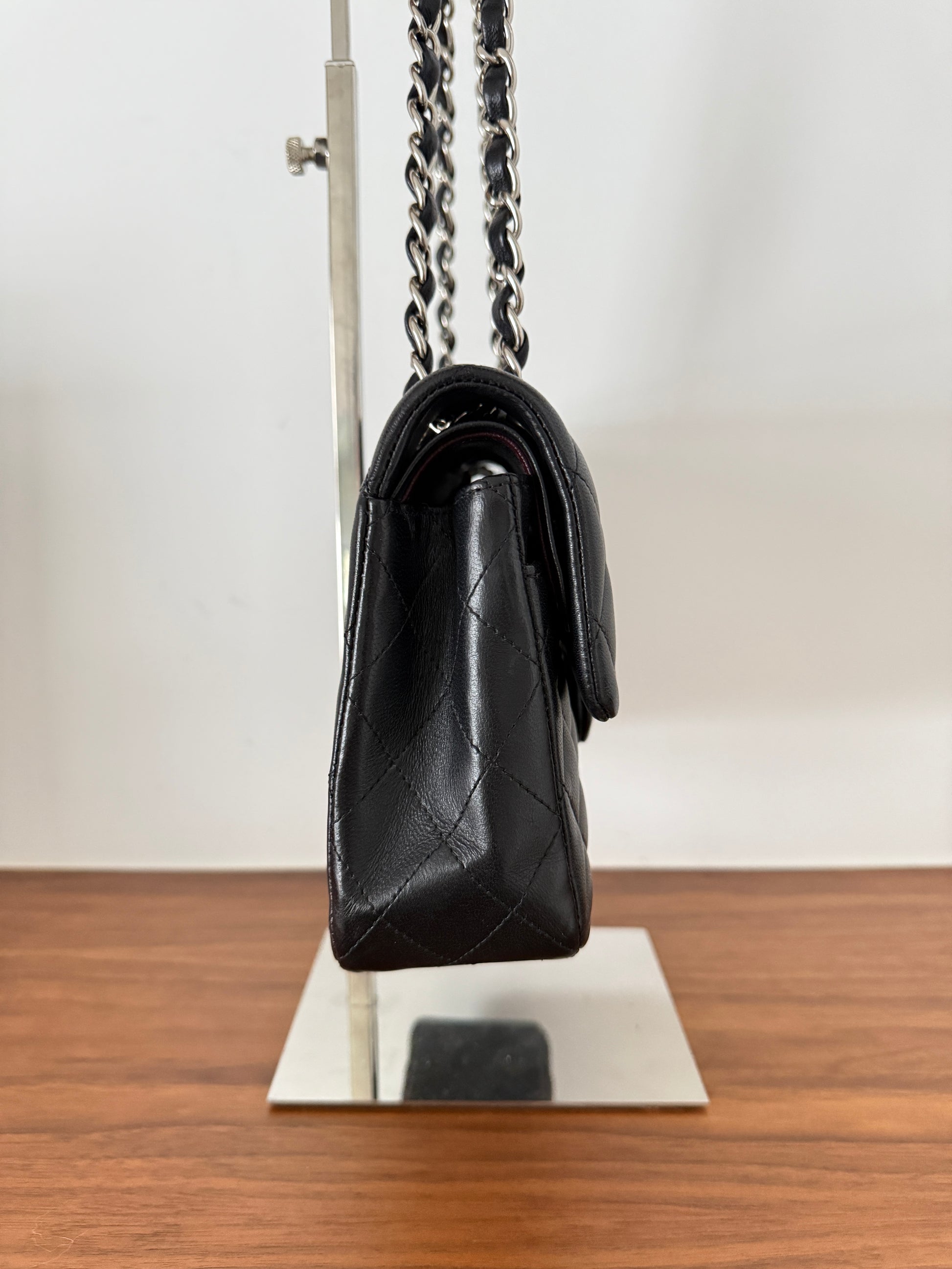 chanel classic double flap in small side view of black leather in excellent condition resale from purseonalshopper authentic