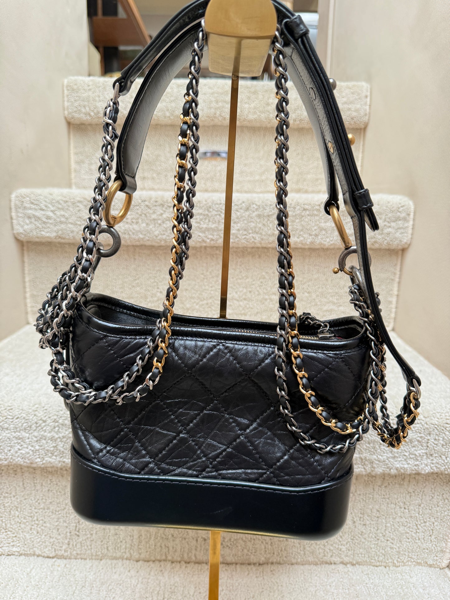 Chanel gabrielle purse in size small iblack showing back side in excellent preloved condition.