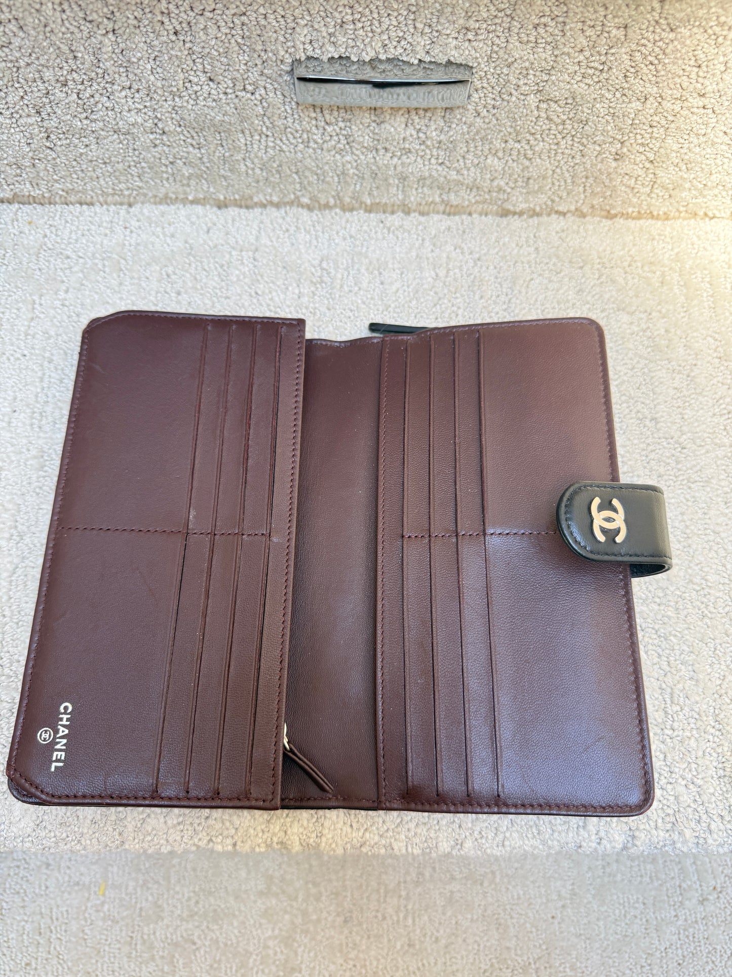 Chanel large wallet with burgundy large interior with 16 card slots and interior zipper used