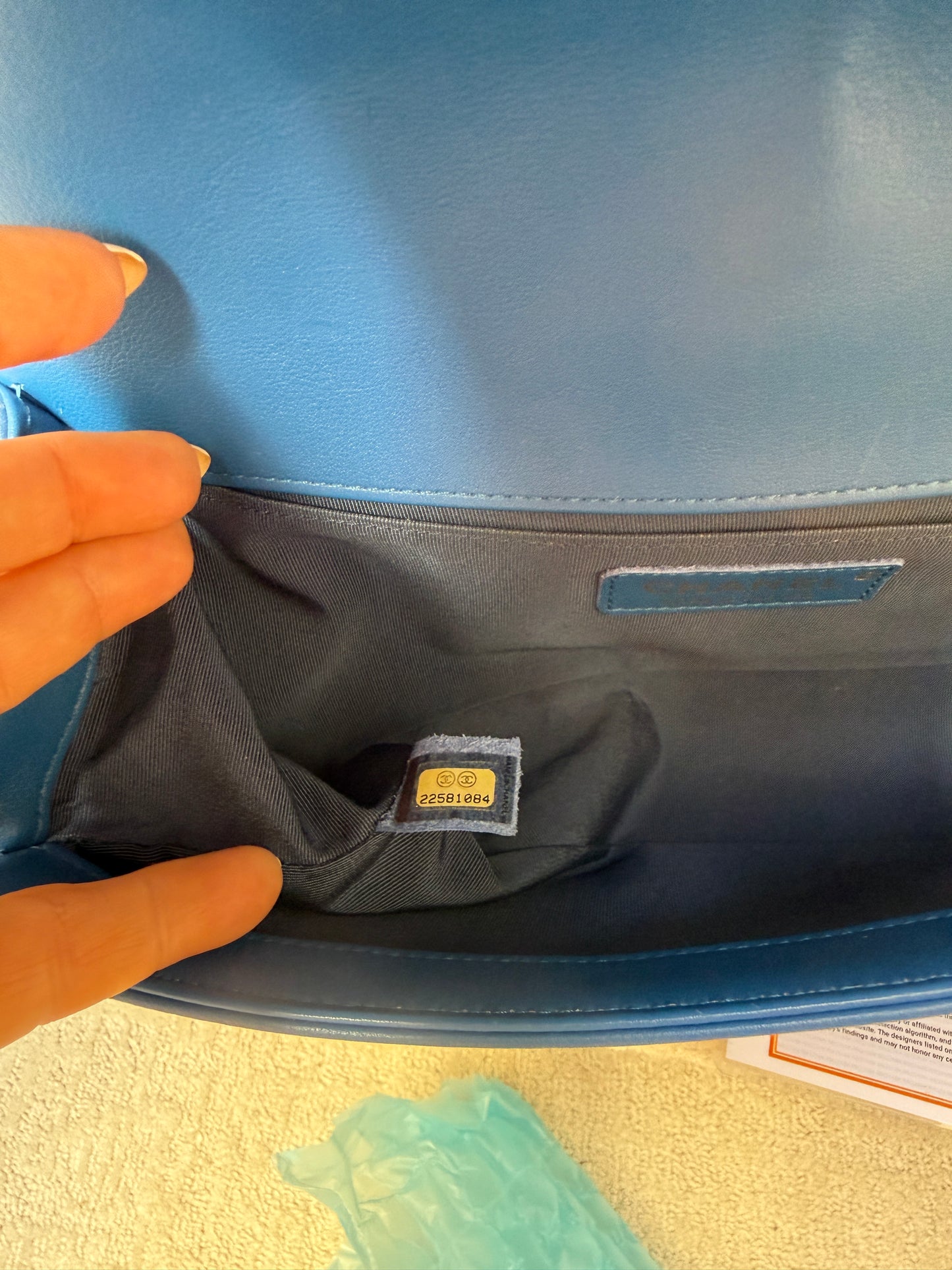 Close up of serial number for chanel boy bag medium Blue