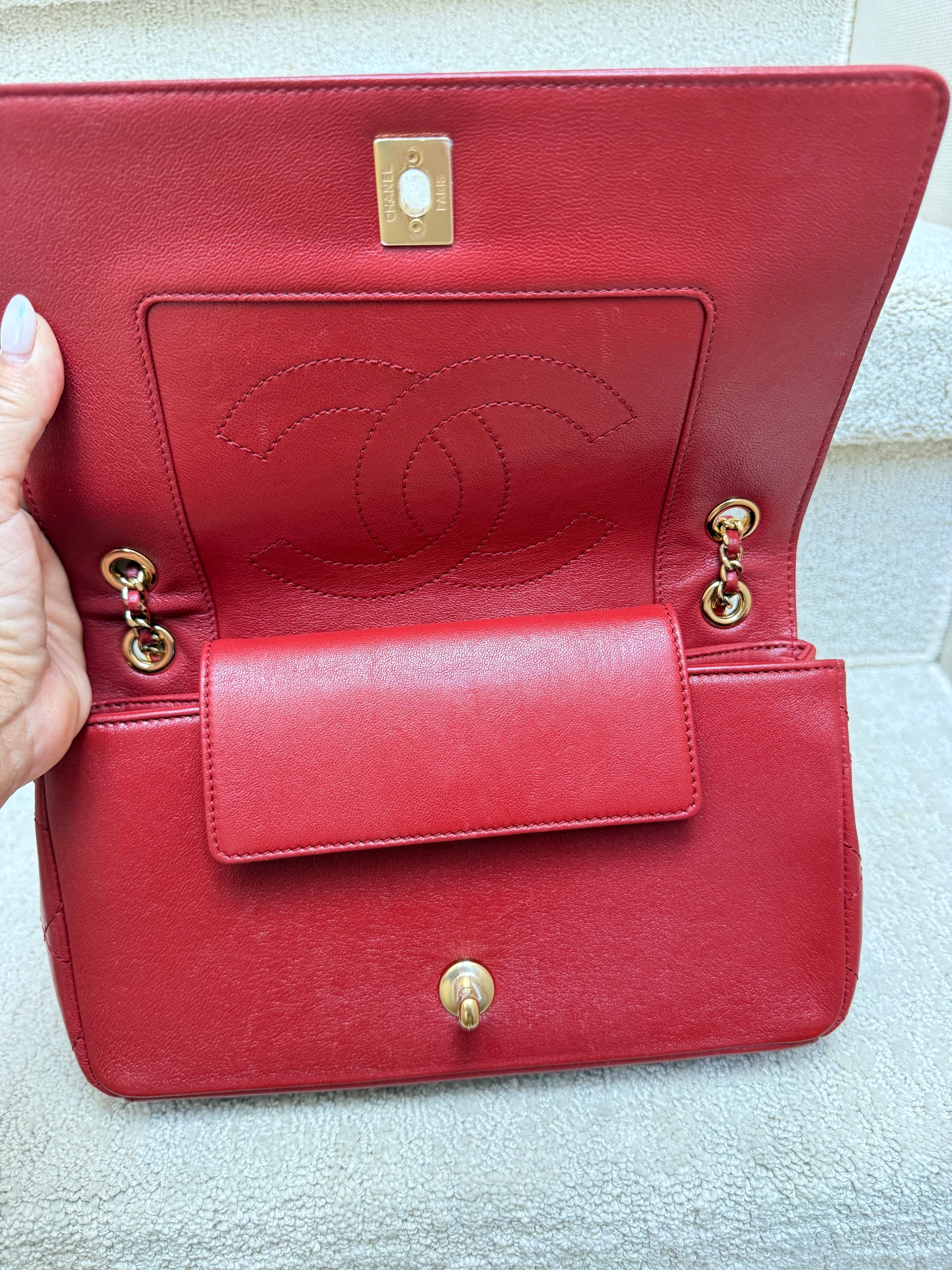 photo under first flap of chanel medium flap in red