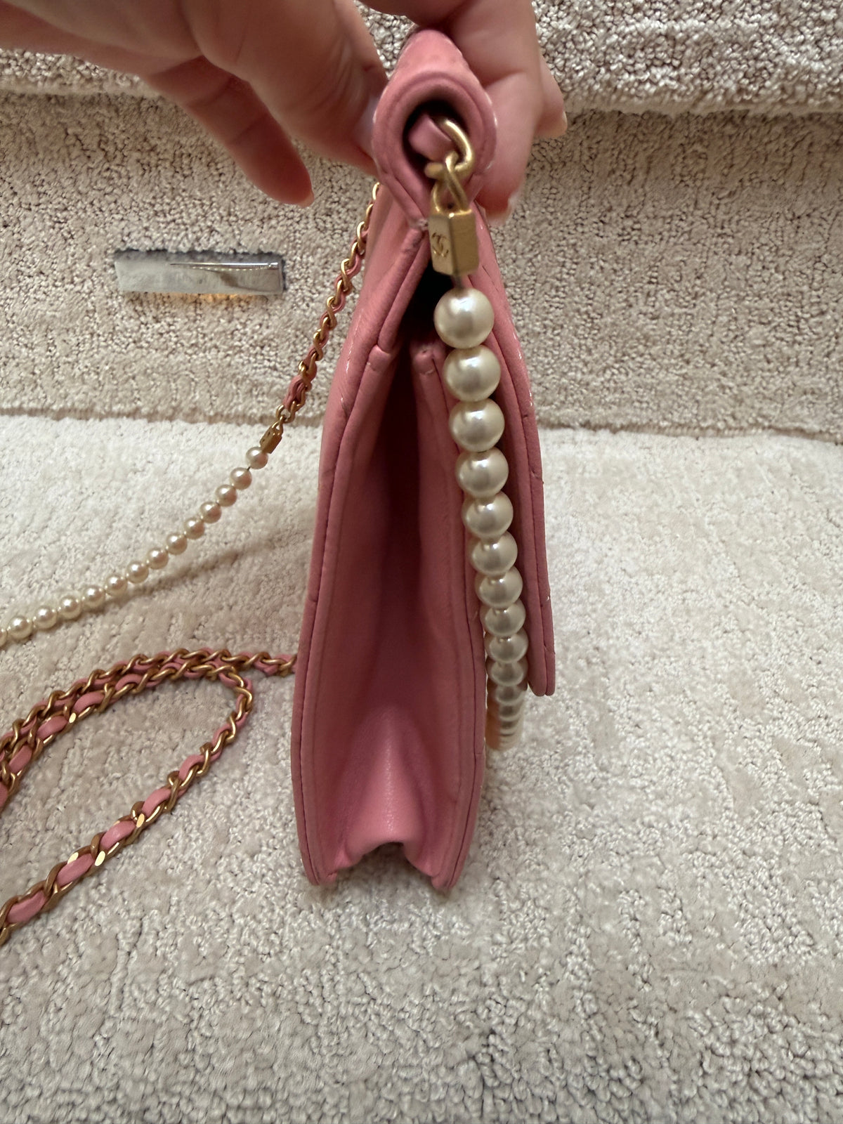 chanel pink flap chic handbag with pearls side view