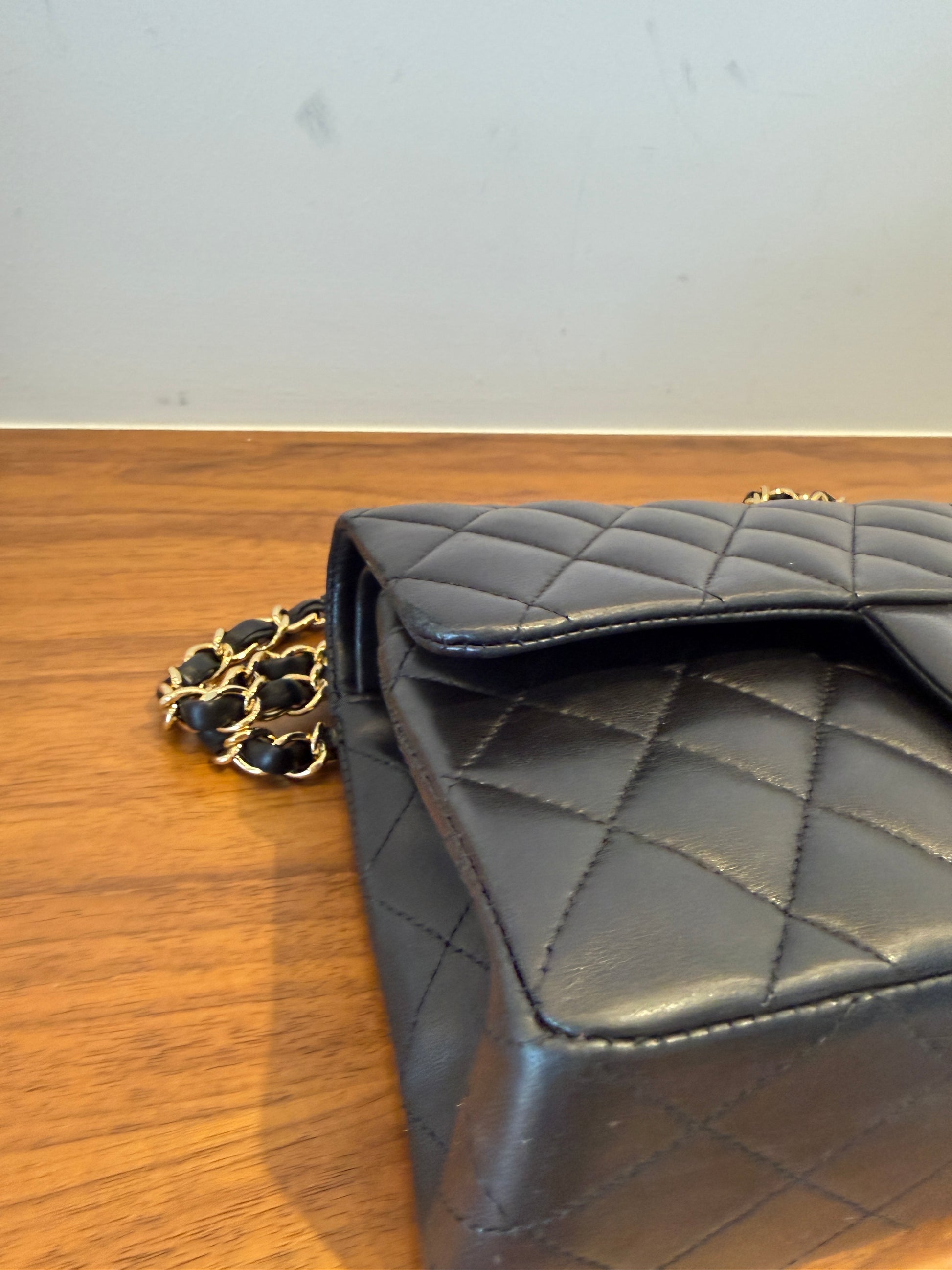 Chanel small classic double flap front left corner clean