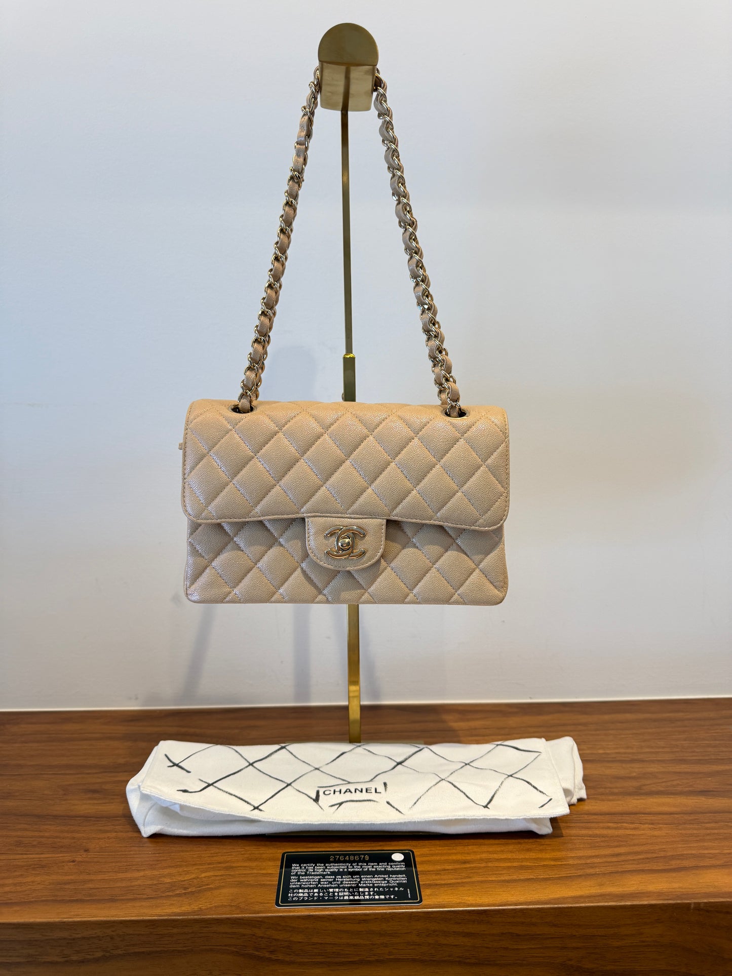 Chanel small classic flap in beige caviar leather with gold hardware includes dustbag