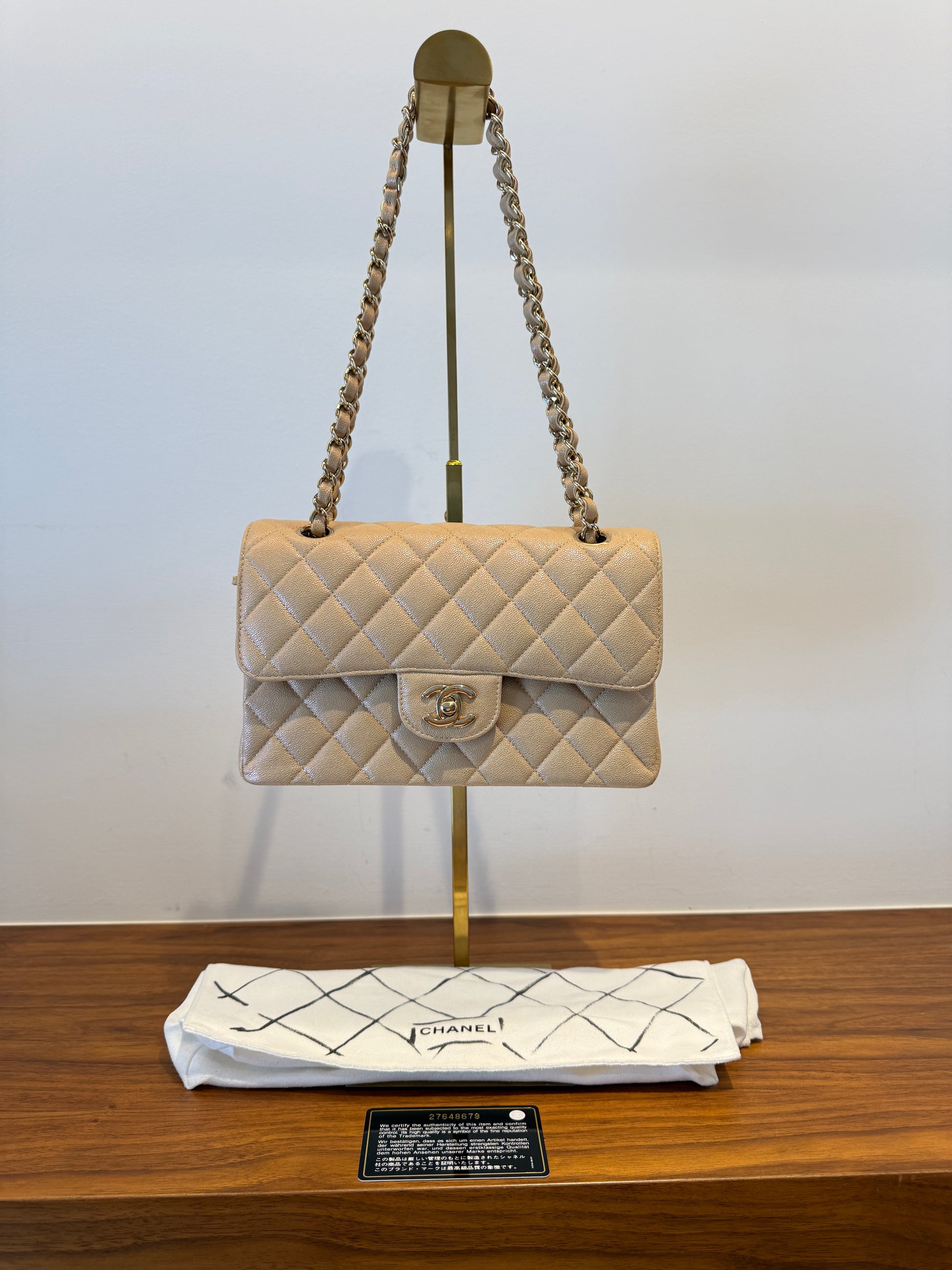 Chanel small classic flap in beige caviar leather with gold hardware includes dustbag