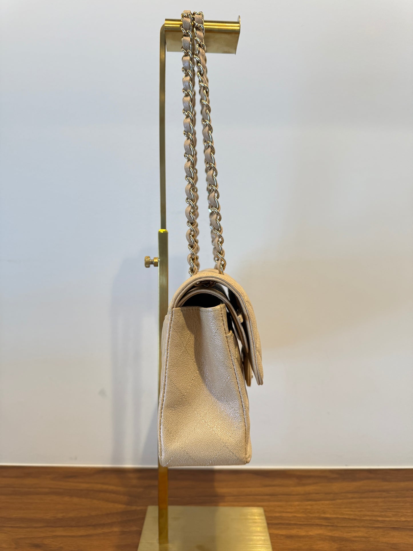 Chanel small double flap in beige caviar leather side view