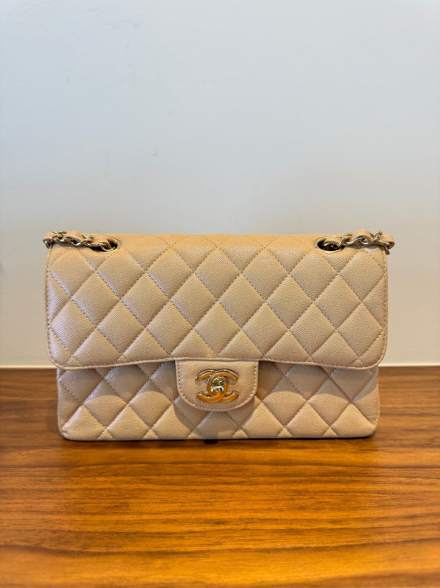Chanel Small Double Classic Flap in caviar beige leather with gold hardware in excellent preloved condition