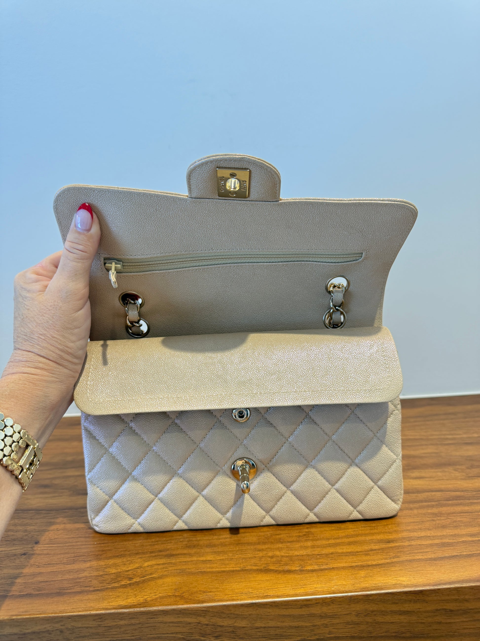 Chanel small double classic flap in beige caviar leather picture under first flap