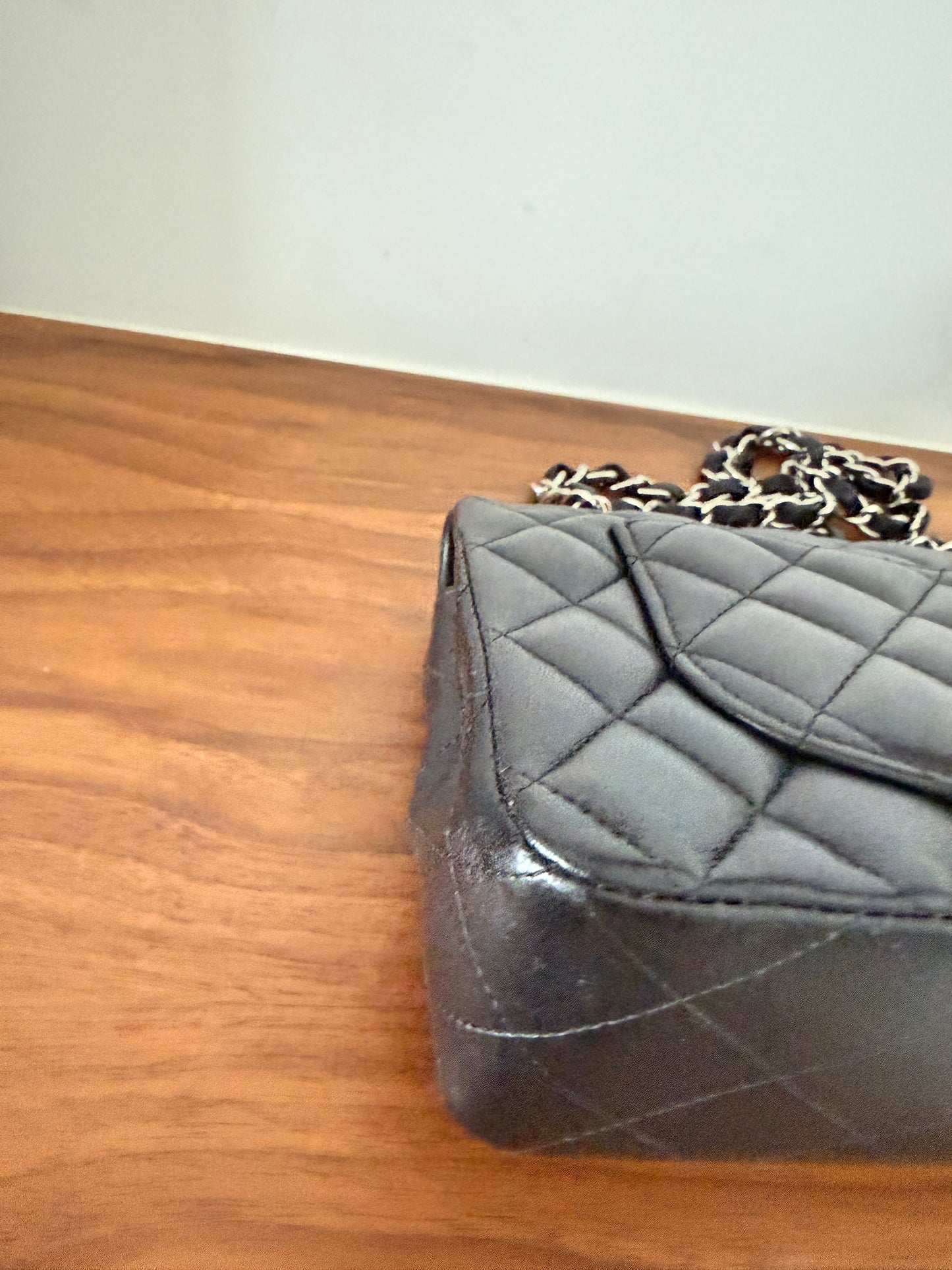 Chanel small double classic flap lambskin black back left corner closeup