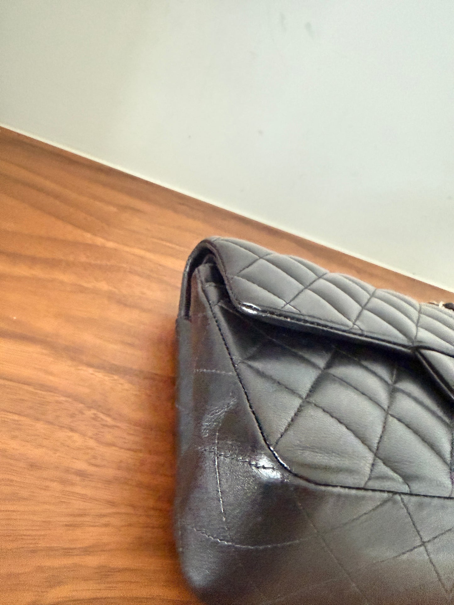 chanel small double classic flap lambskin black front right corner close up