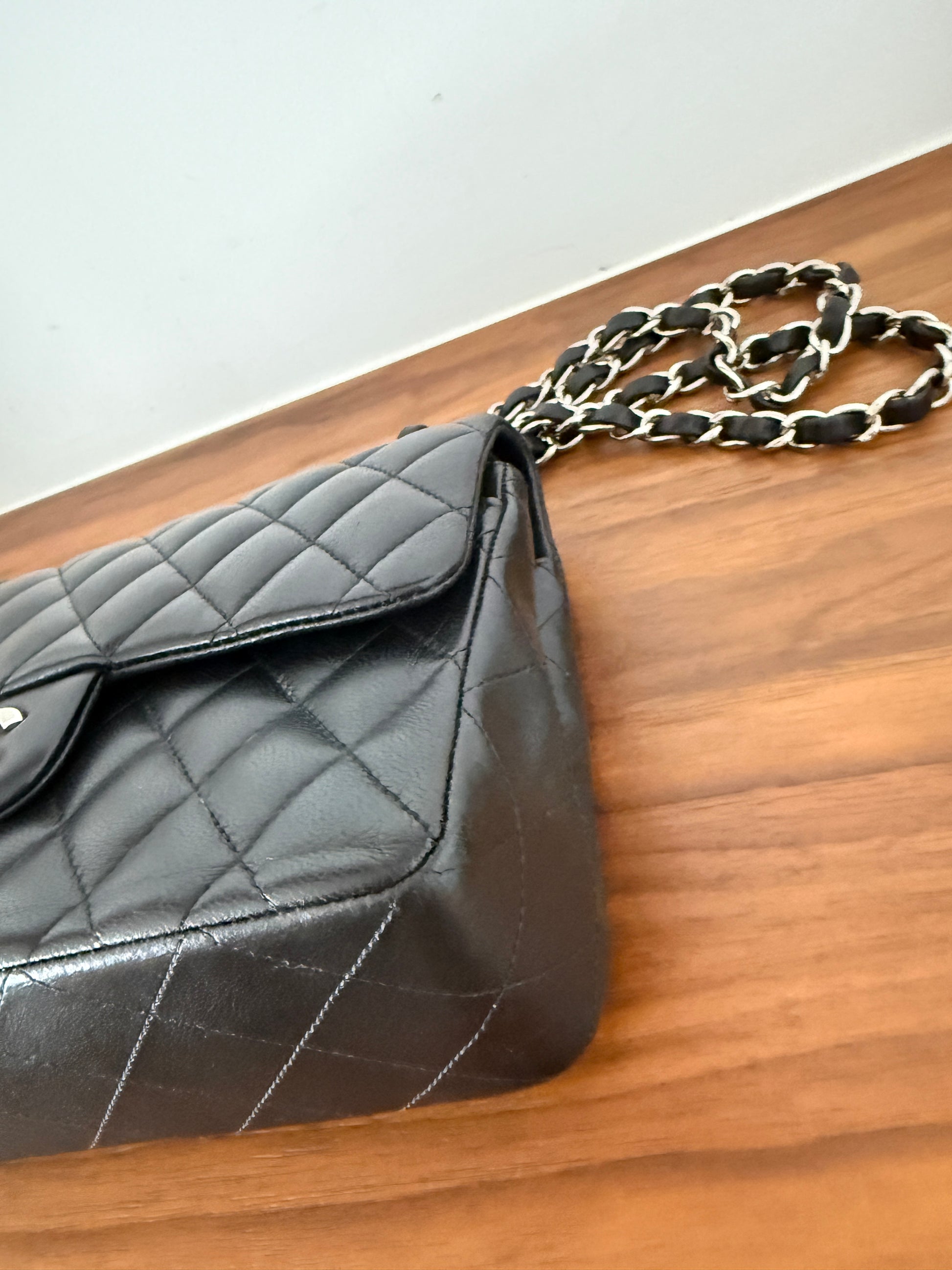 Chanel small double classic flap lambskin front right corner closeup