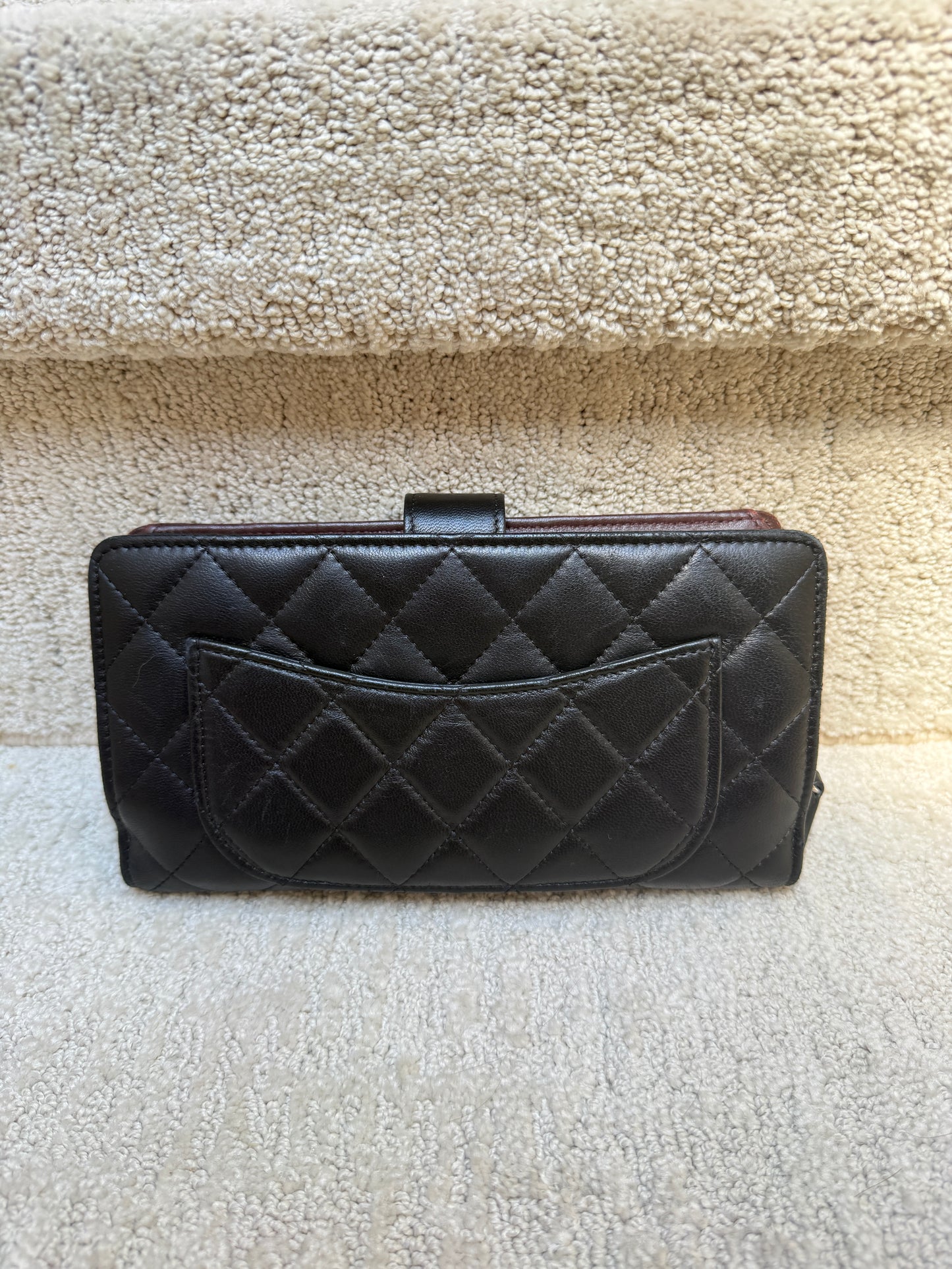 Chanel Large size wallet preowned back of wallet shown with outside slip pocket