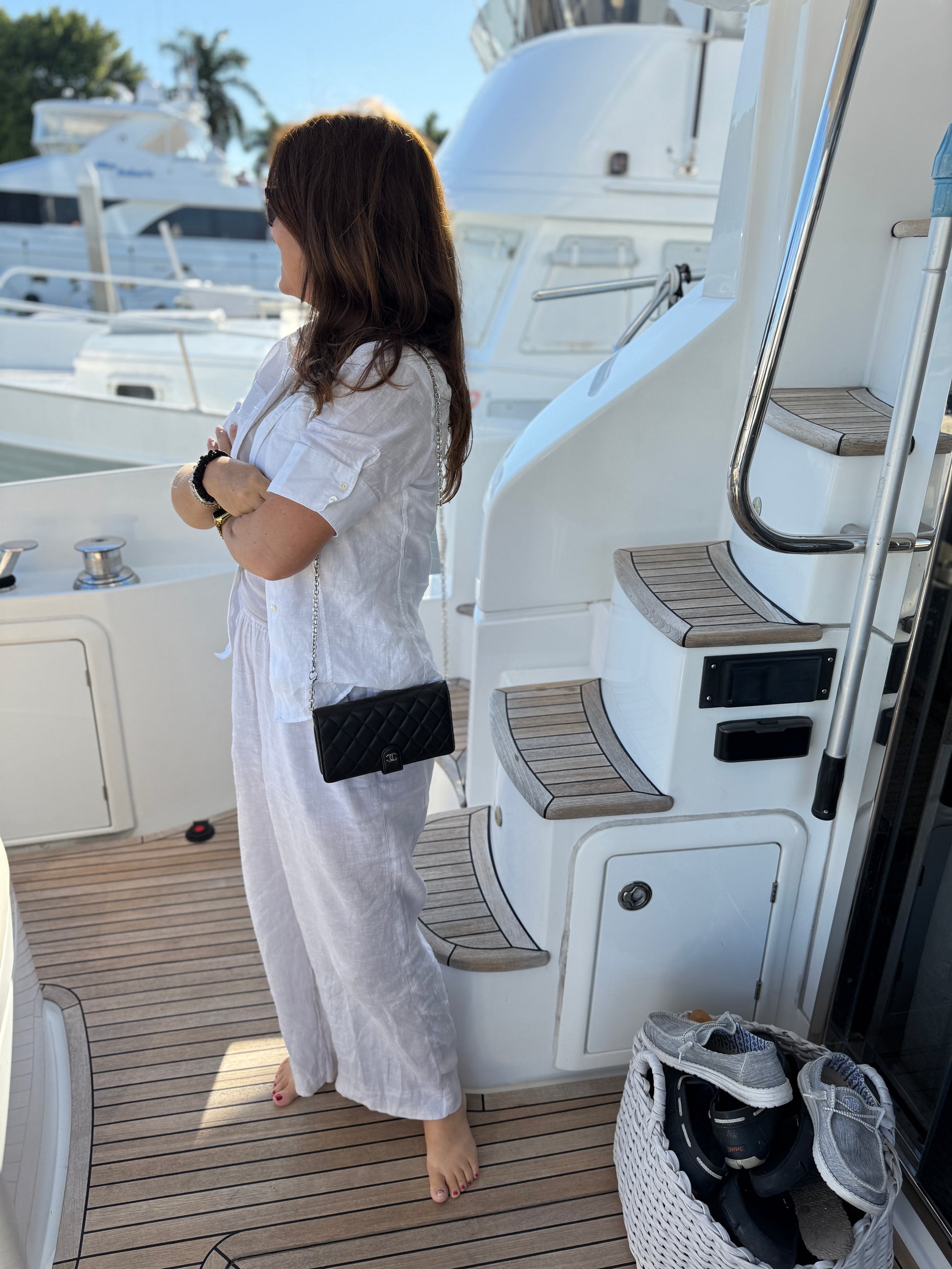 Chanel wallet on 3rd party chain shown on woman used in excellent condition