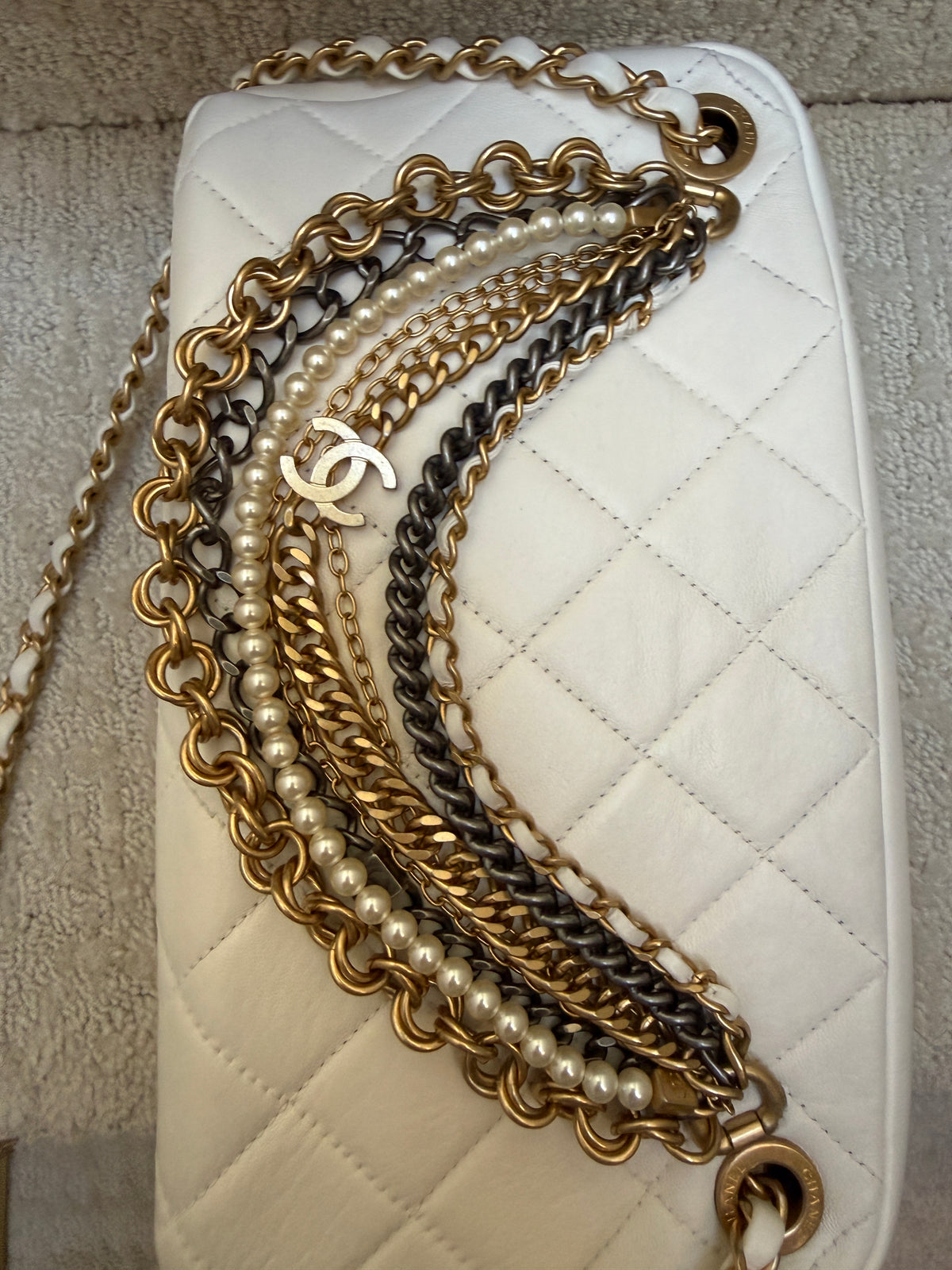 chanel all about chains disco bag close up of chains in gold, silver and pearls