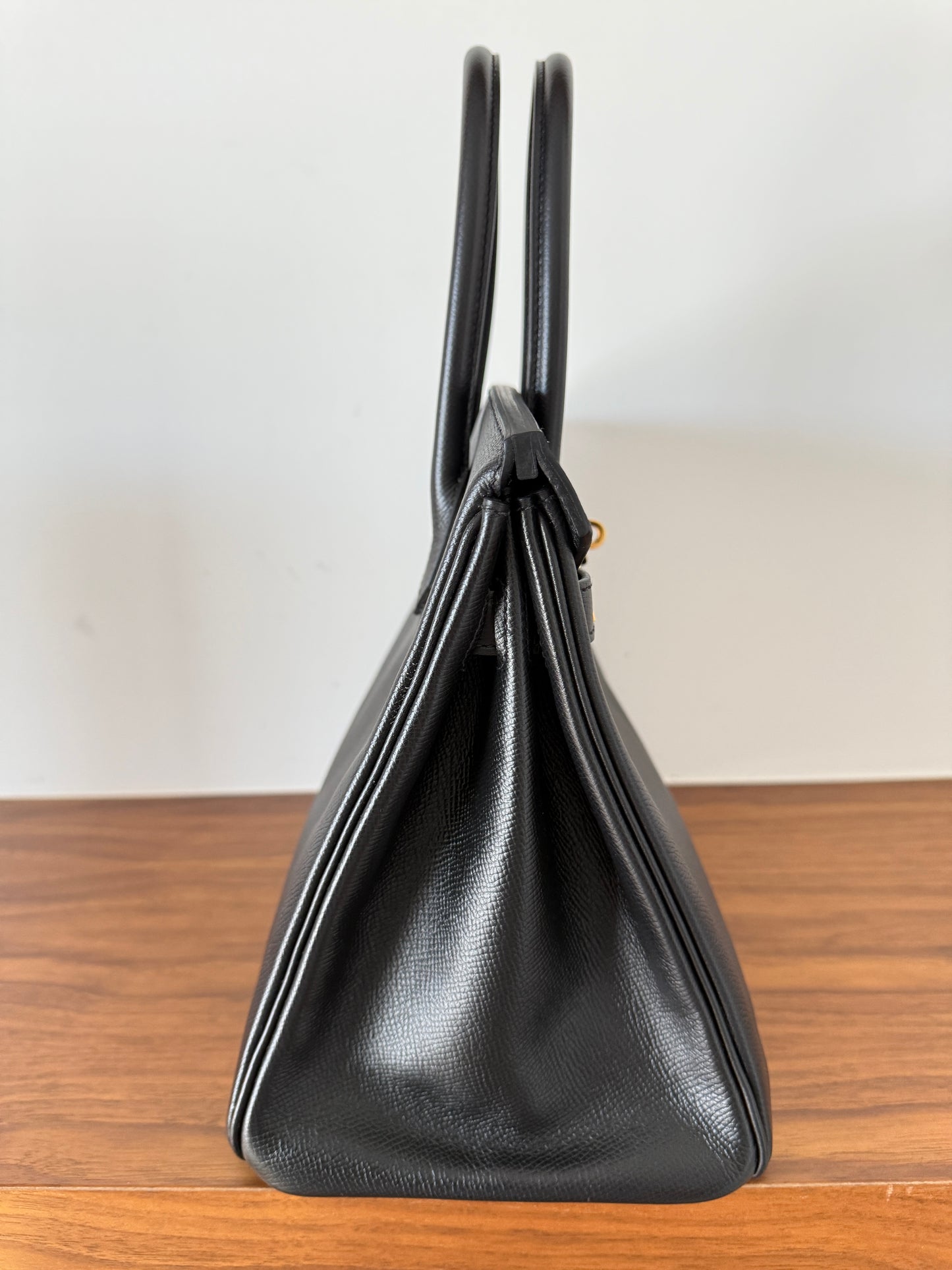 Side view of Hermes birkin 30 bag in black resale