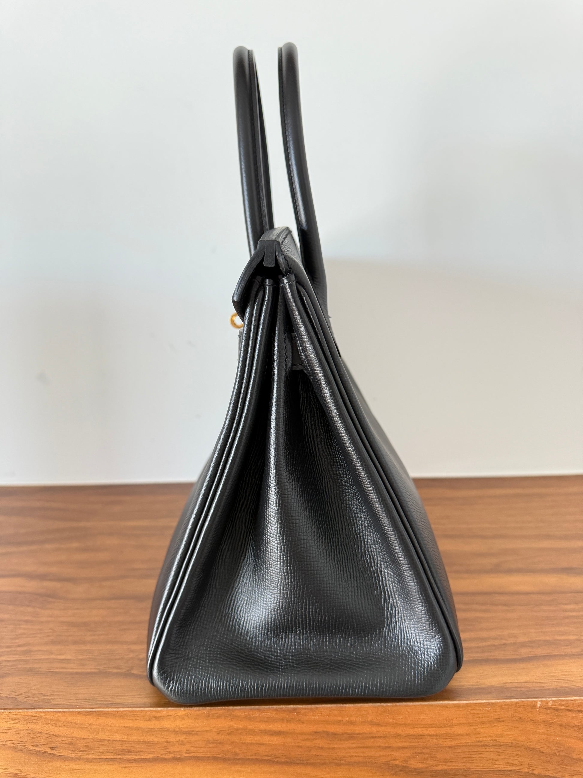 Side view of hermes birkin bag in black size 30 consignment