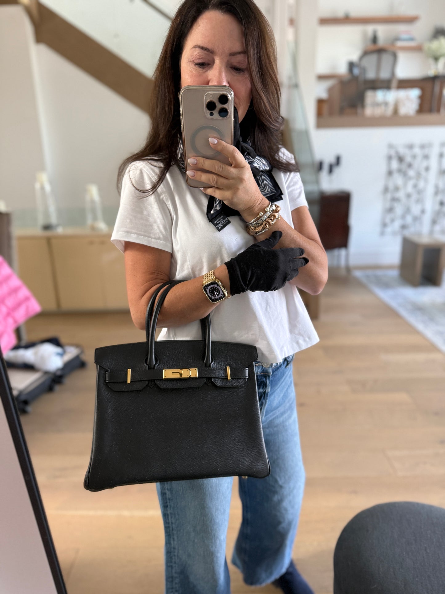 photo of woman holding hermes birkin 30 in epsom leather offered for sale from purseonalshopper