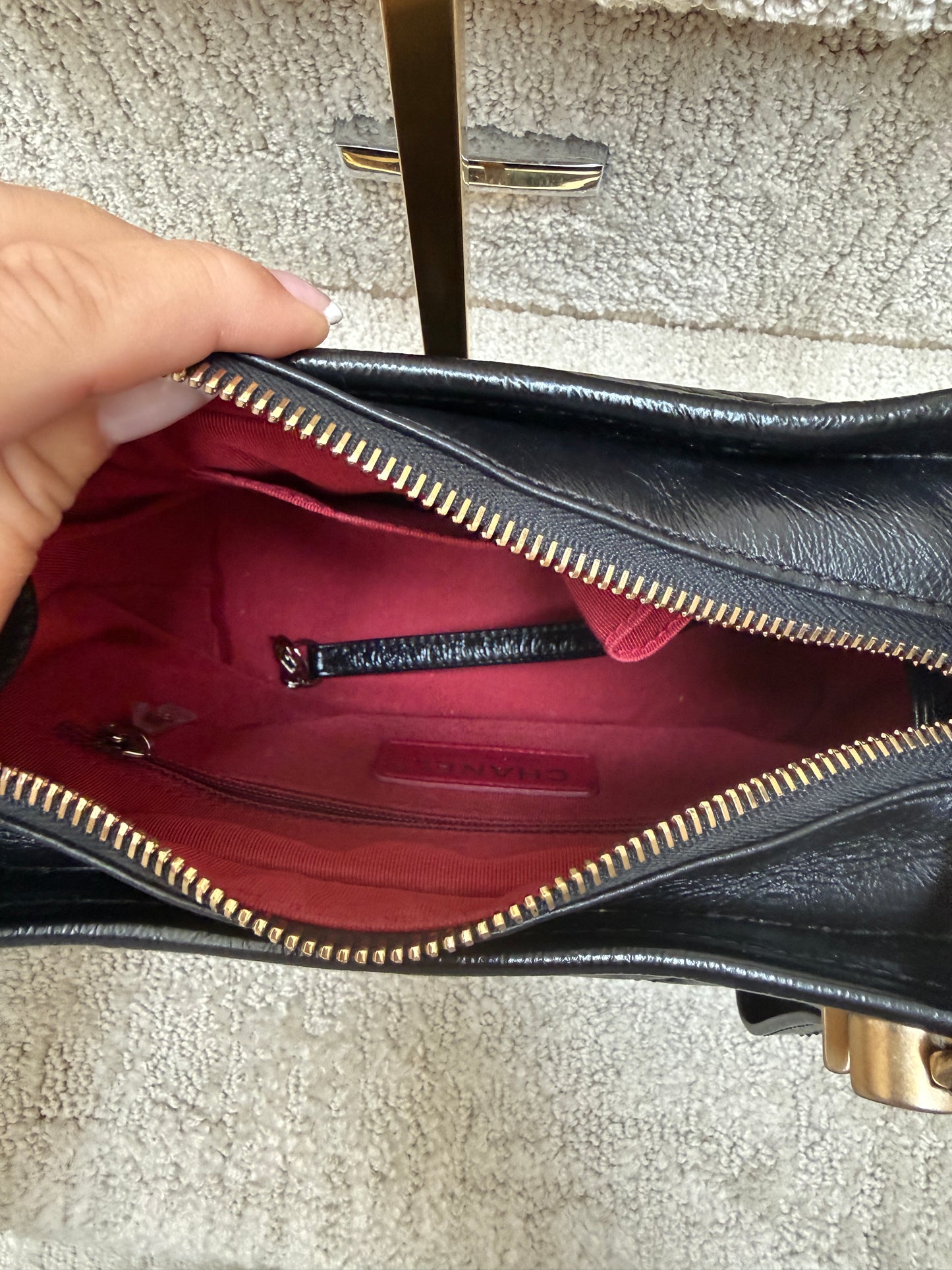 Chanel Gabrielle Hobo red fabric interior with zipper pocket