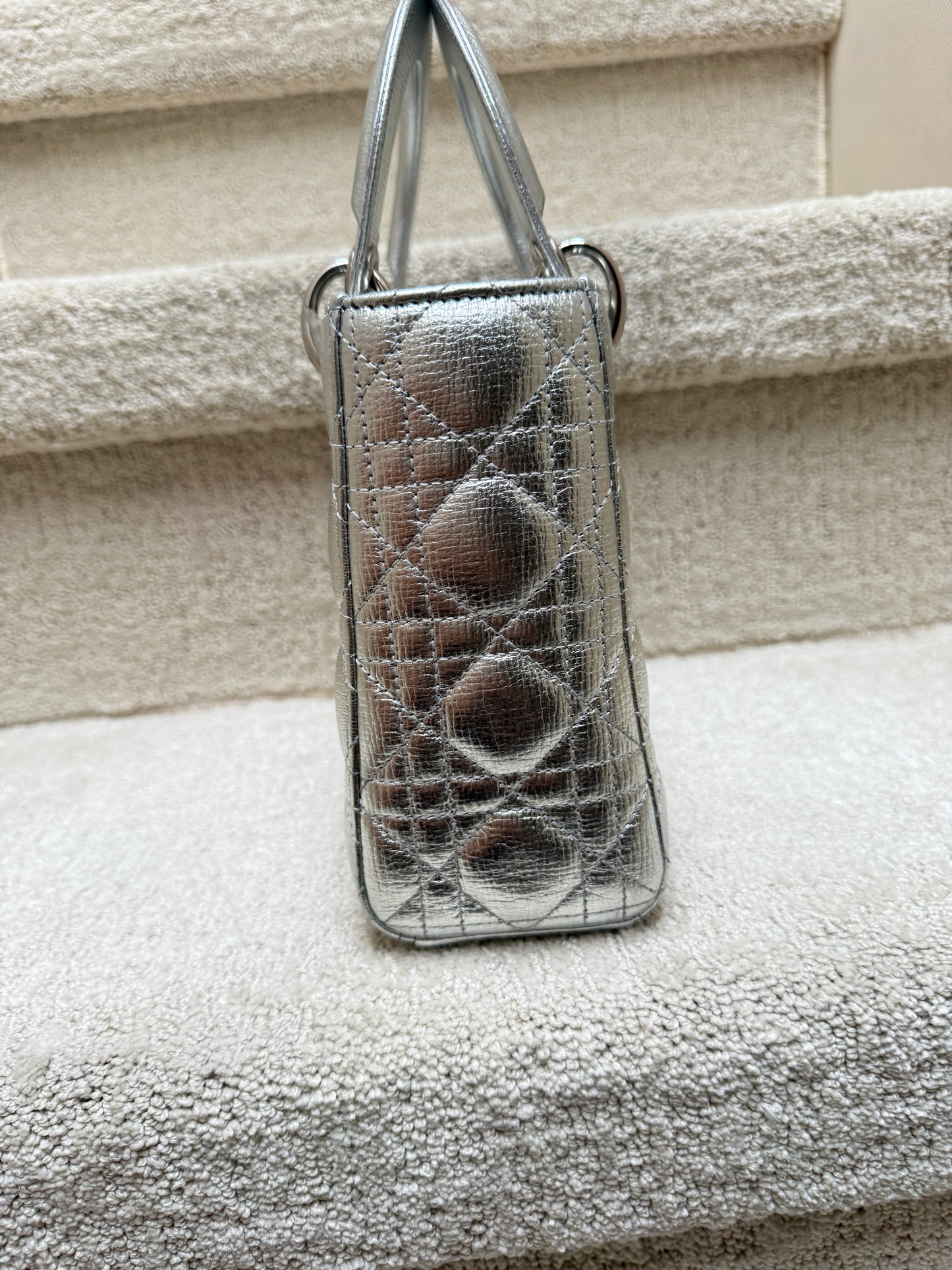 Authentic and preloved lady dior handbag for sale showing side view