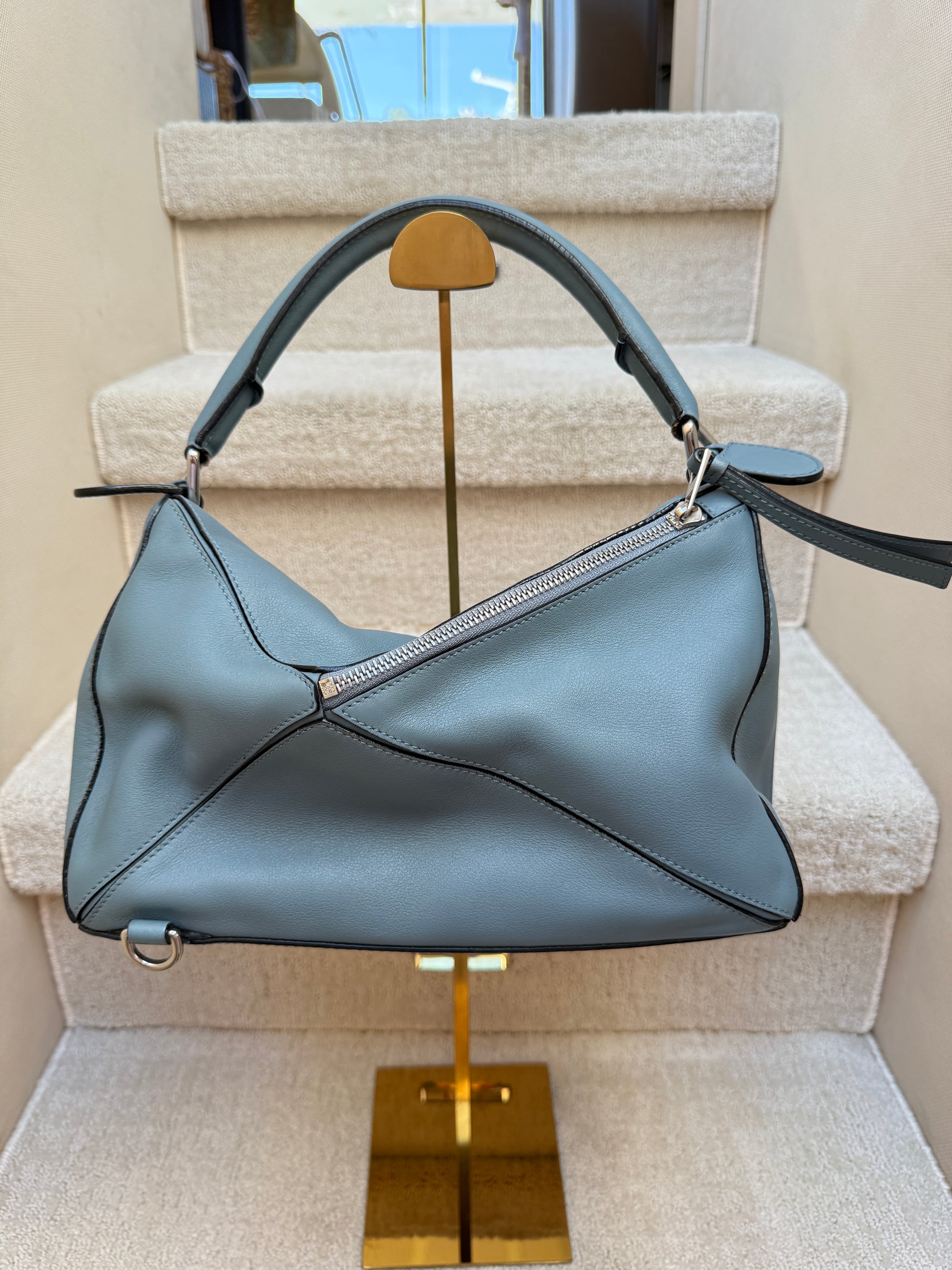 loewe puzzle purse opposite side of bag showing small zipper and clean leather