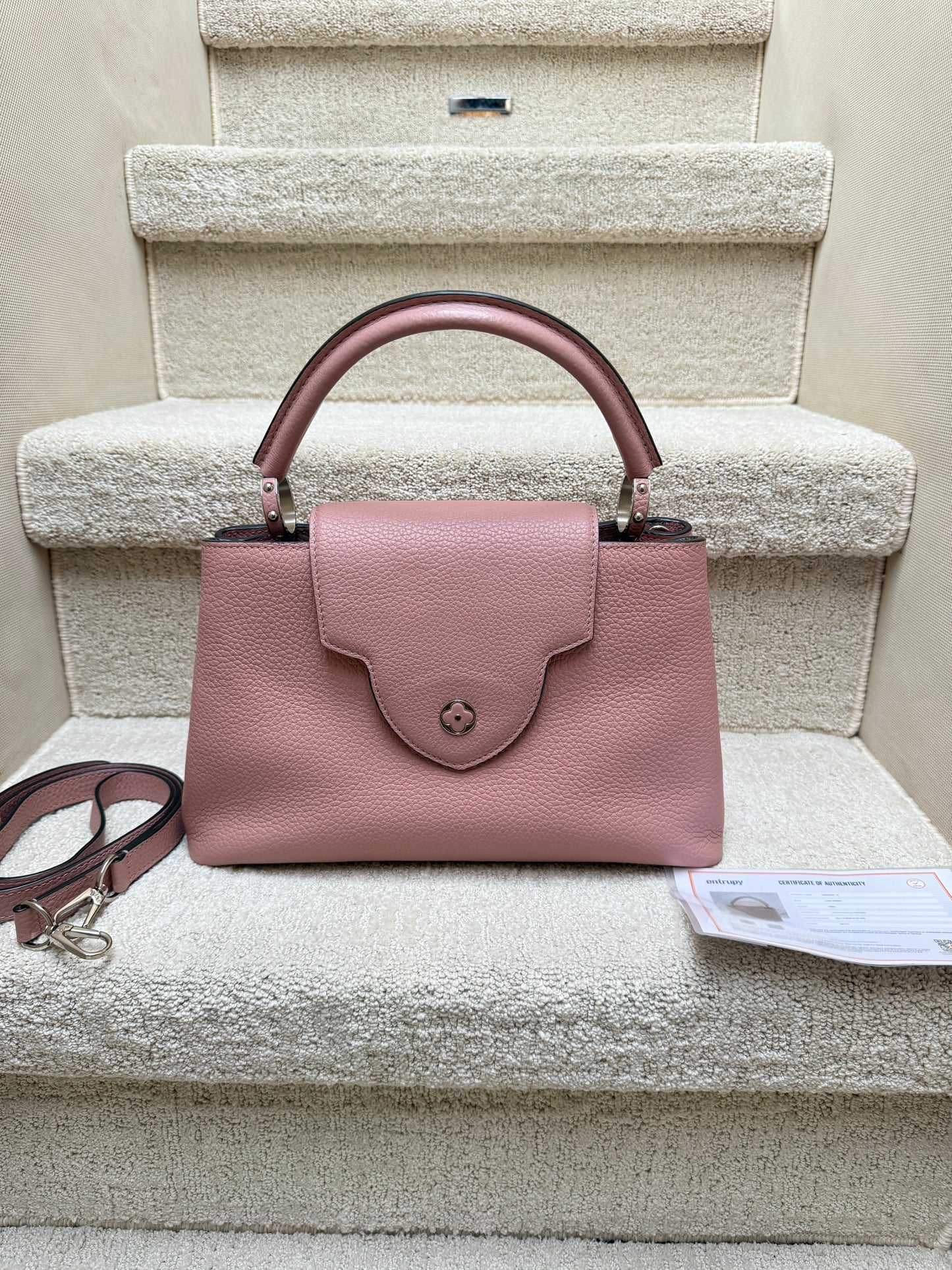 louis vuitton capucines purse in pink view of flower flap outside of bag