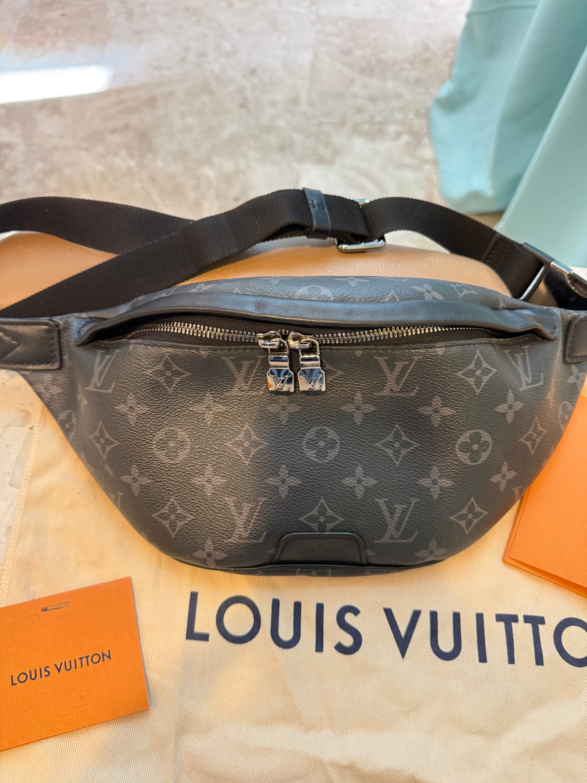 Louis Vuitton monogram discovery waist bag with dustbag and cards in like new condition authentic and preowned from purseonalshopper.