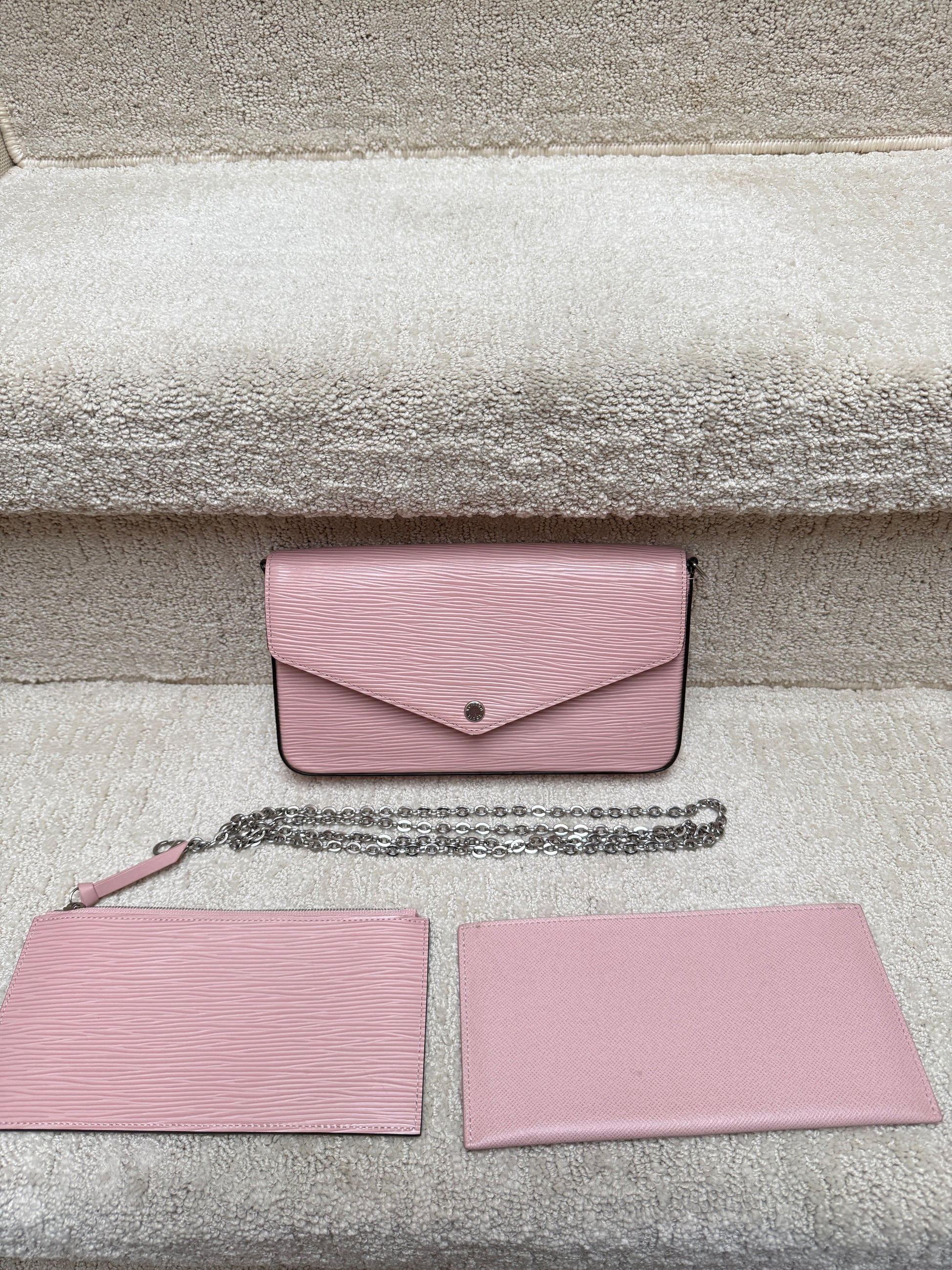 louis vuitton pink wallet in pouch with silver chain used in excellent condition