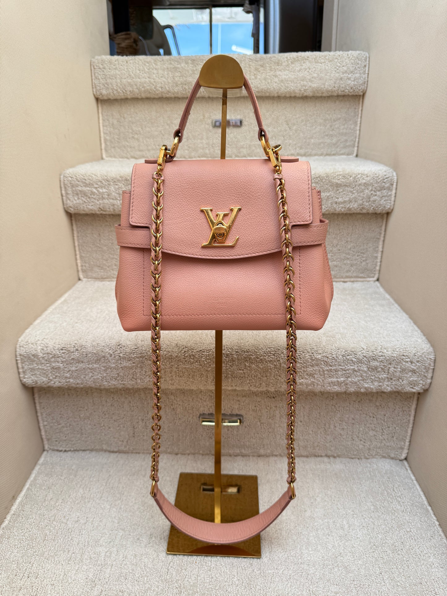 louis vuitton lock me ever small handbag in blush pink with gold hardware authentic and preowned from purseonalshopper