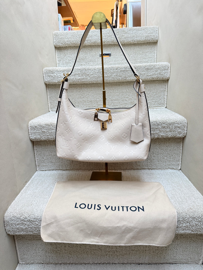 Louis Vuitton Monogram Empriente Sport sac in cream full view