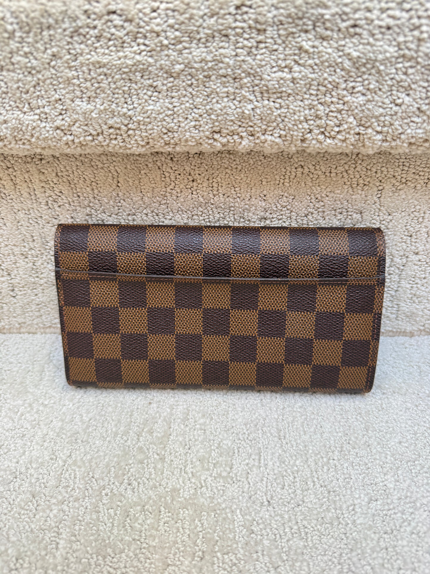 Back side photo of louis vuitton sarah wallet for sale used