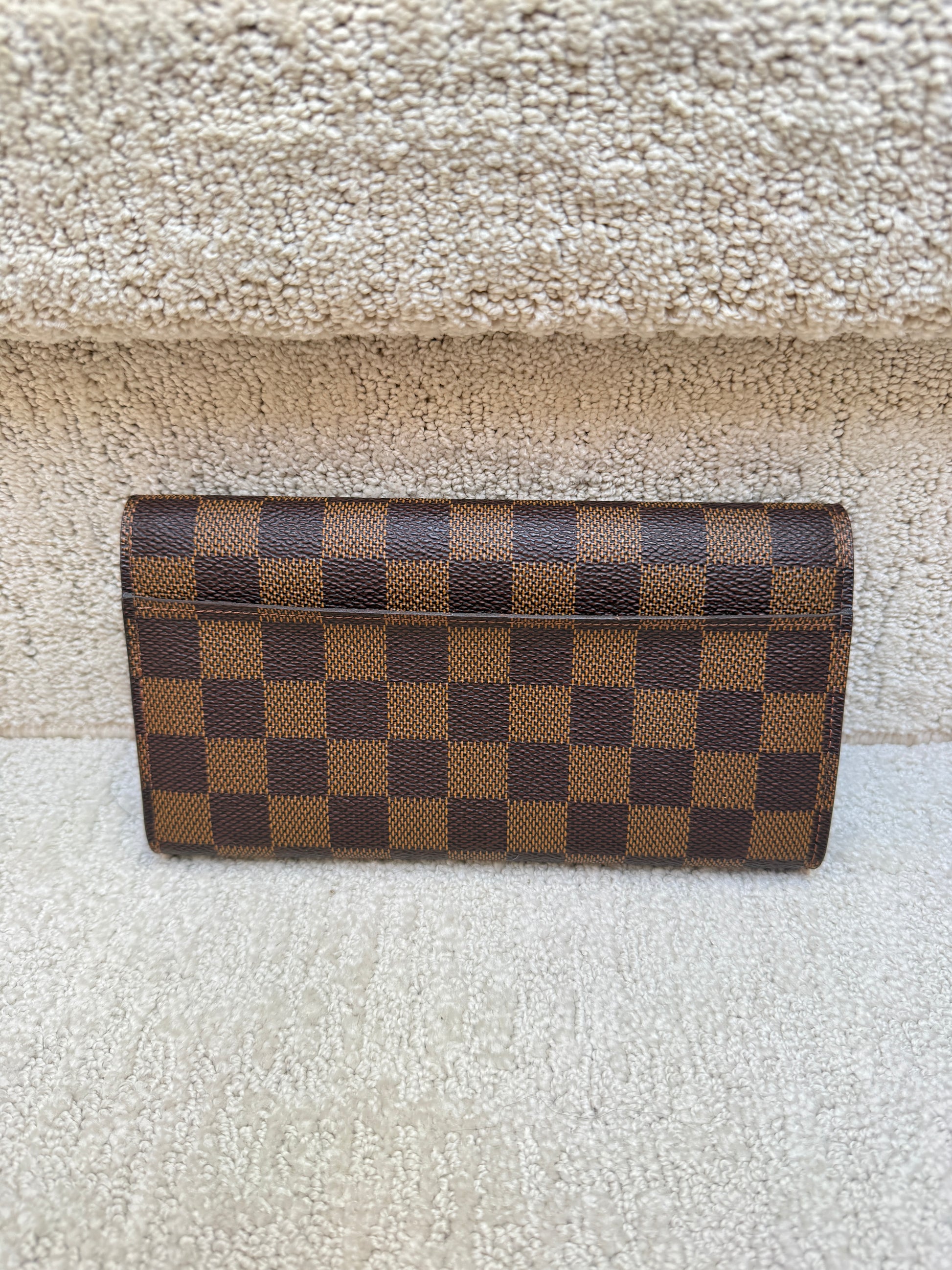 Back side photo of louis vuitton sarah wallet for sale used