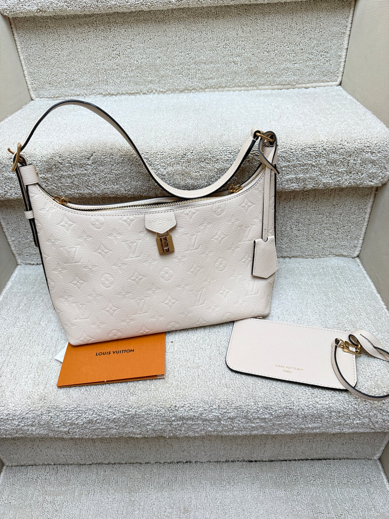 Louis Vuitton sports sac in cream with a view of the removable pouch full set
