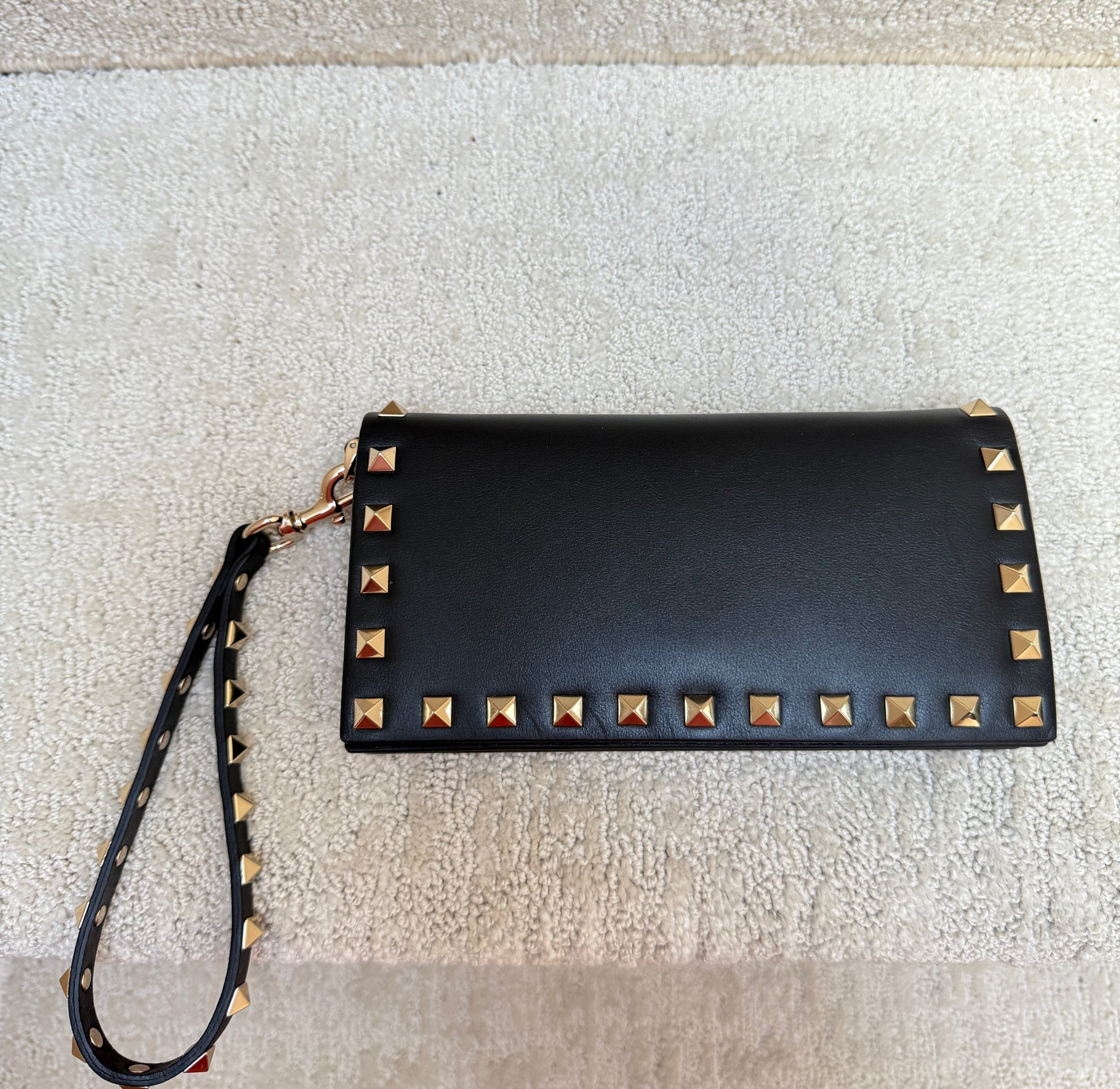 Valentino Clutch in Black and Gold Showing back side of handbag New Purseonashopper