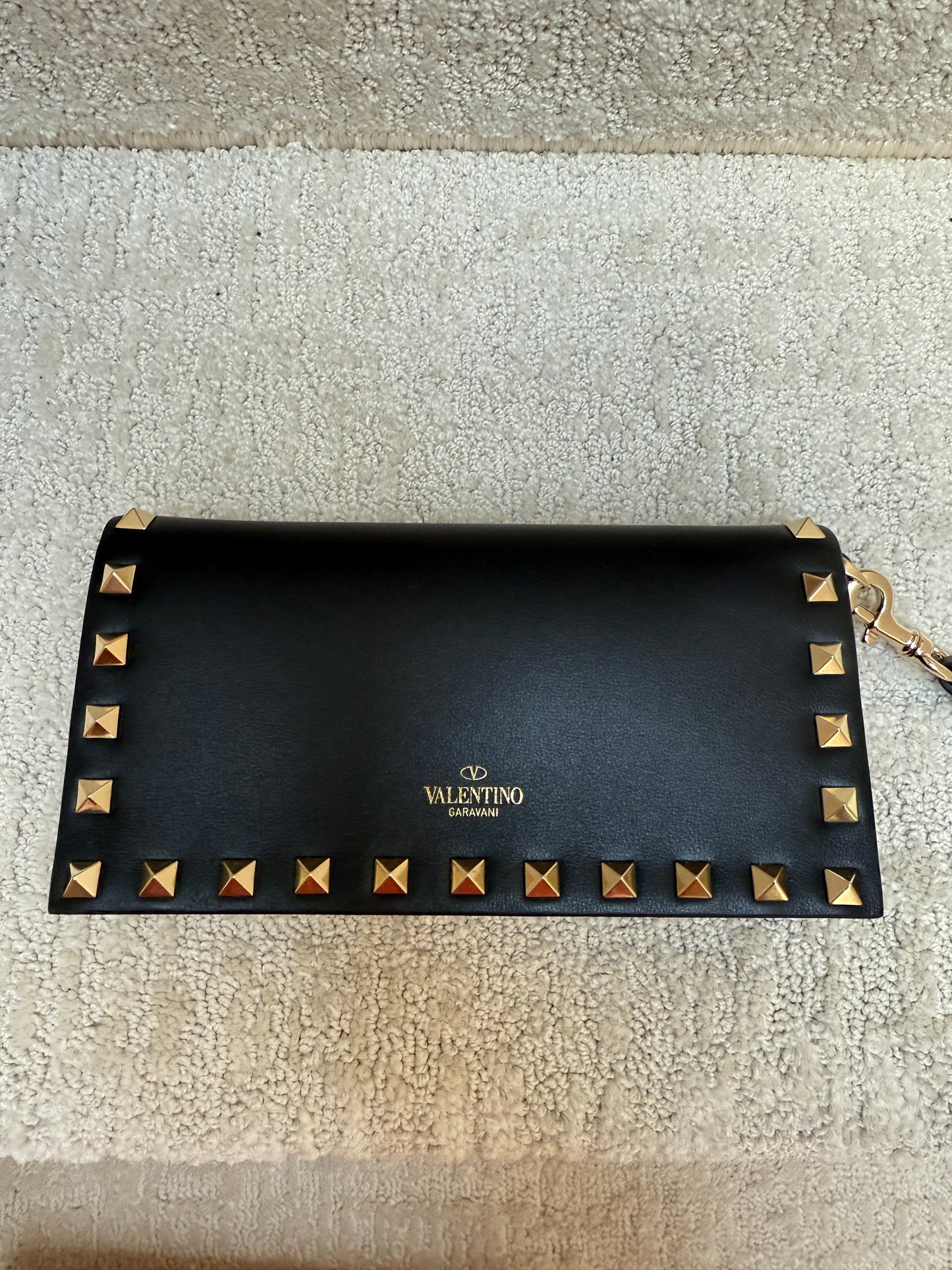 Close up of Valentino Clutch Wristlet in Black with Gold Studs Brand New